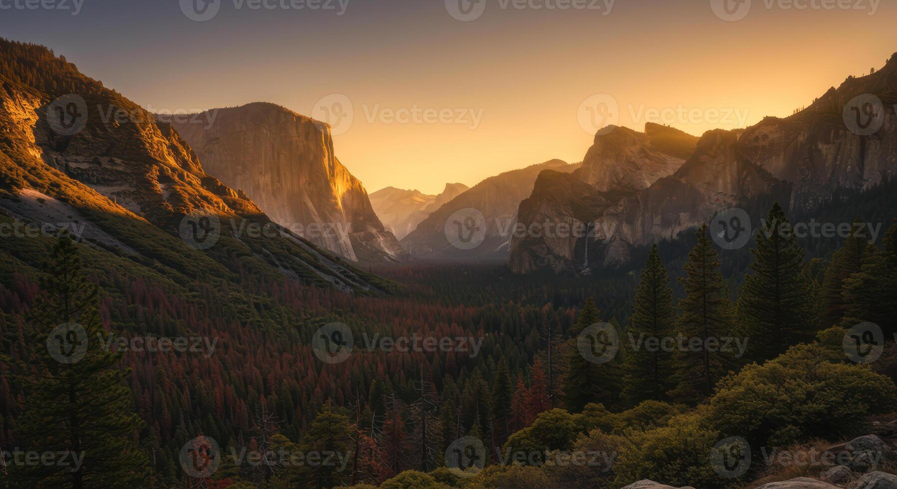 Golden sunlight bathes Yosemite Valleys El Capitan and Bridalveil Fall in a stunning natural mountain landscape photo