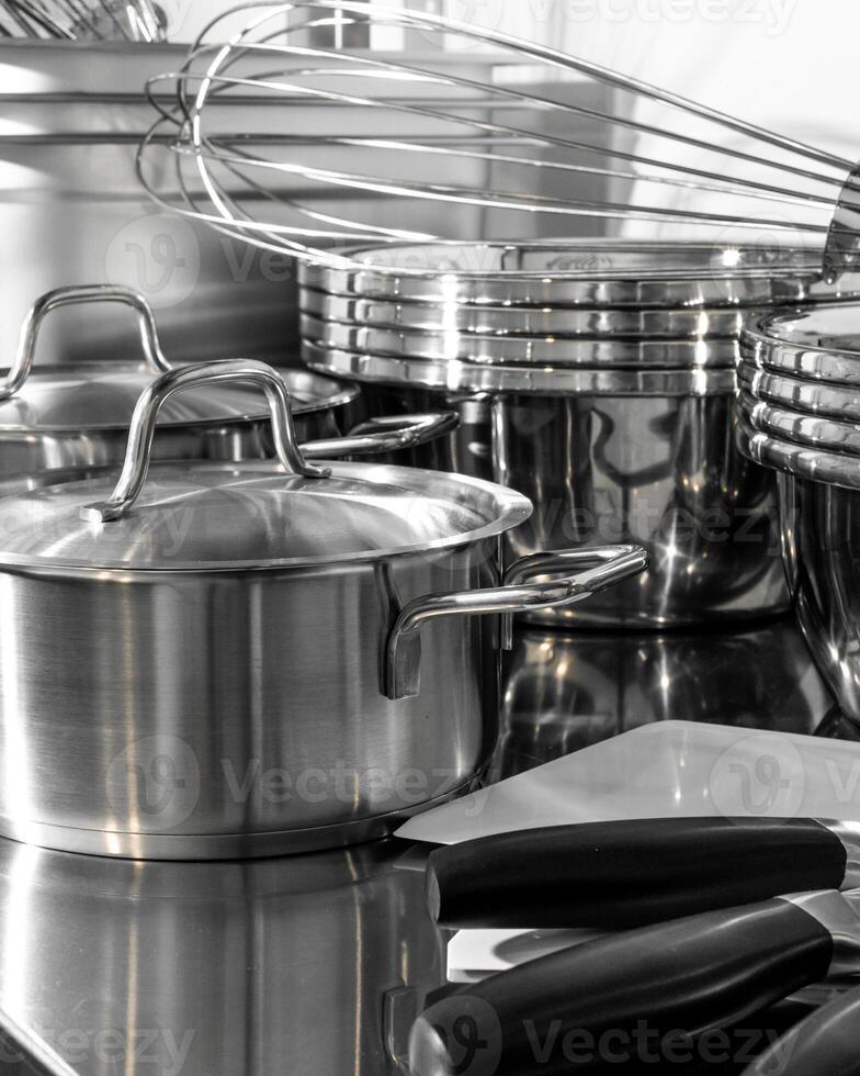 Glistening symphony of chrome pots and whisks, echoing culinary alchemy, St Honore Cake Day gleam, kitchen poetry in motion photo