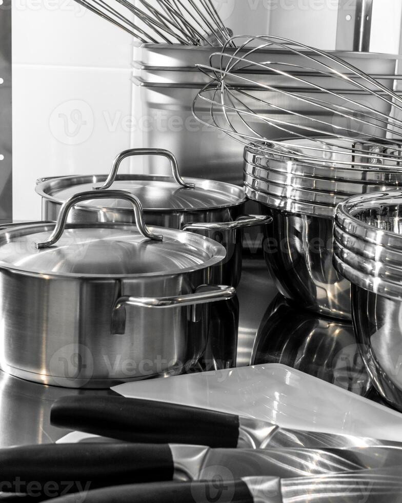 Gleaming steel pots and whisks whisper culinary symphony, evoking Lunar New Year feast preparations and International Chef Day mastery photo