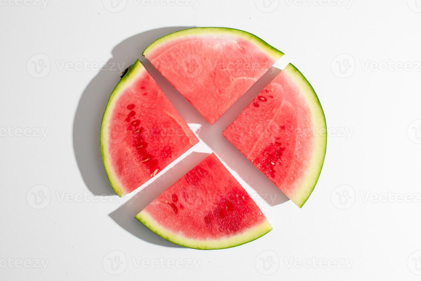 Juicy watermelon slices radiate like a summer solstice sunburst, invoking picnics, vitamin rich refreshment, and fruit fueled creativity photo