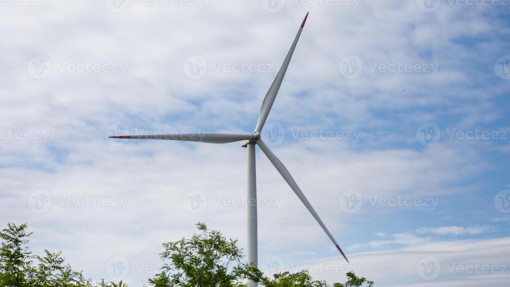Whispering wind turbine against celestial canvas, energizing eco symphony, green innovations, and Earth Days silent celebration of renewal photo