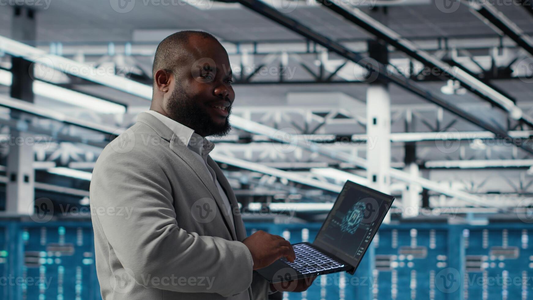 Smiling data center technician installing and upgrading hardware components. Happy server farm employee doing job tasks, implementing backup solutions to protect against data loss, camera B photo