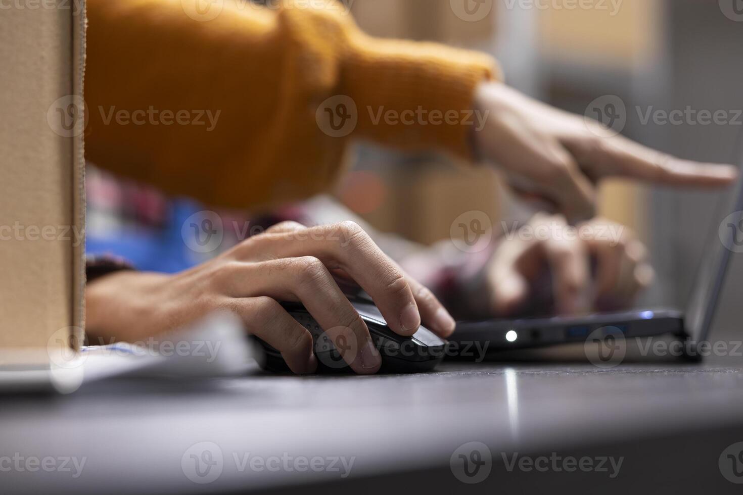 Small business staff members prepare goods and boxes for local shipment, retail depot. Asian people work on efficient order processing and express shipment for a growing local brand. photo
