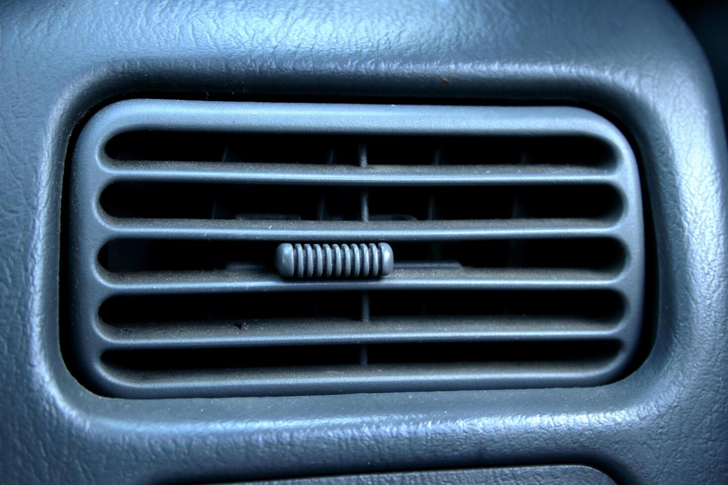 Close up black color retro style car air vent detail and design in Thailand. photo