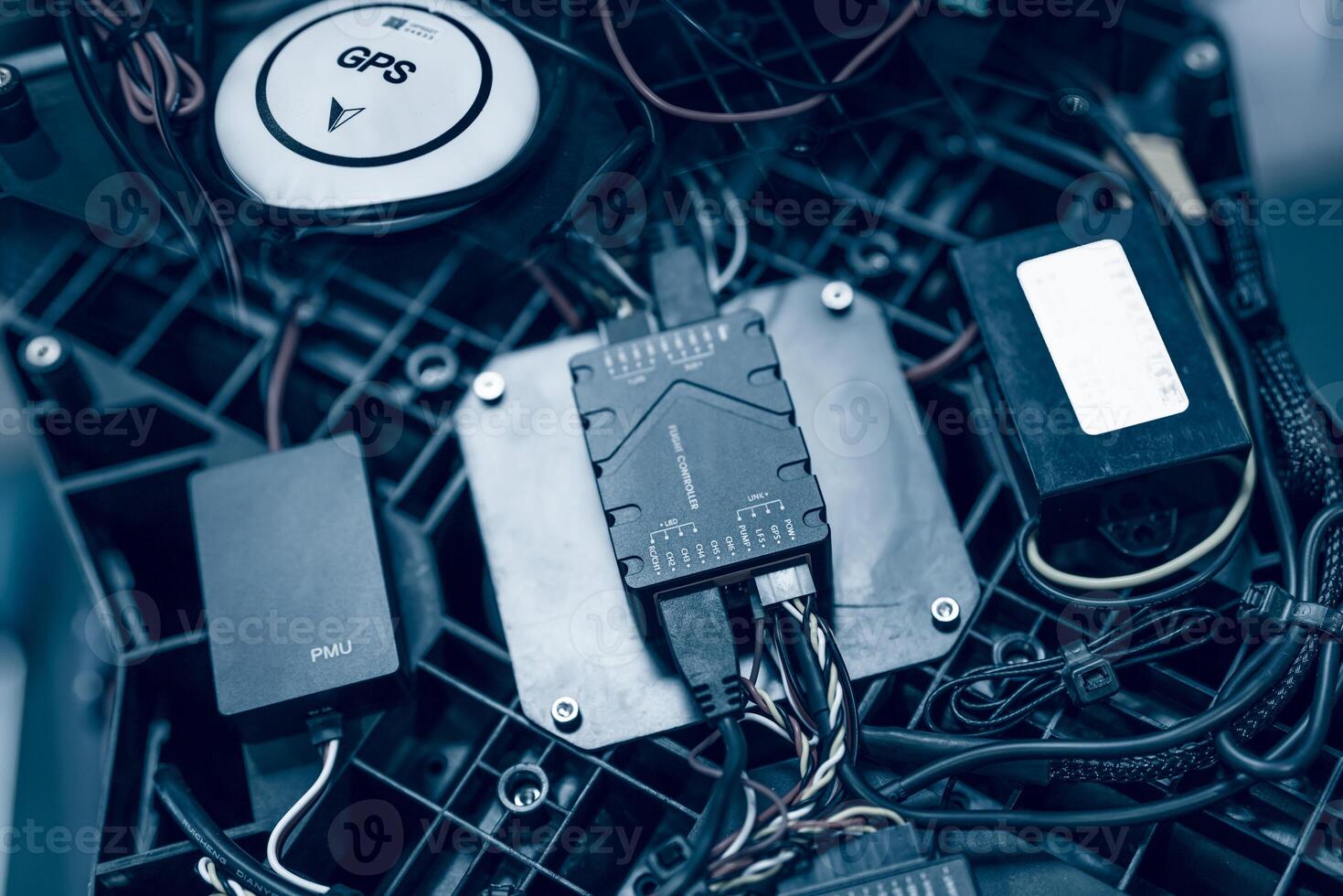 Agricultural drone flight control electronics. Power management unit and GPS module. Precision crop monitoring and automation. PMU and GPS navigation modules. Smart farming. Agricultural technology. photo