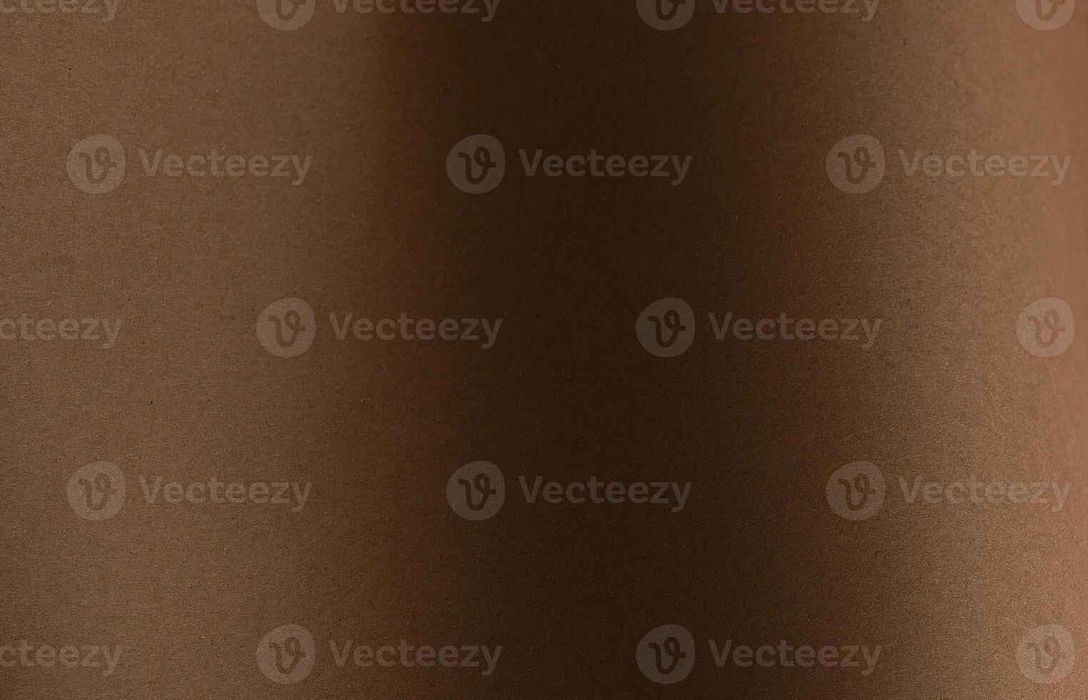 Chocolate brown designer paper sheet with smooth matte texture. Simple, minimalistic backdrop, photo