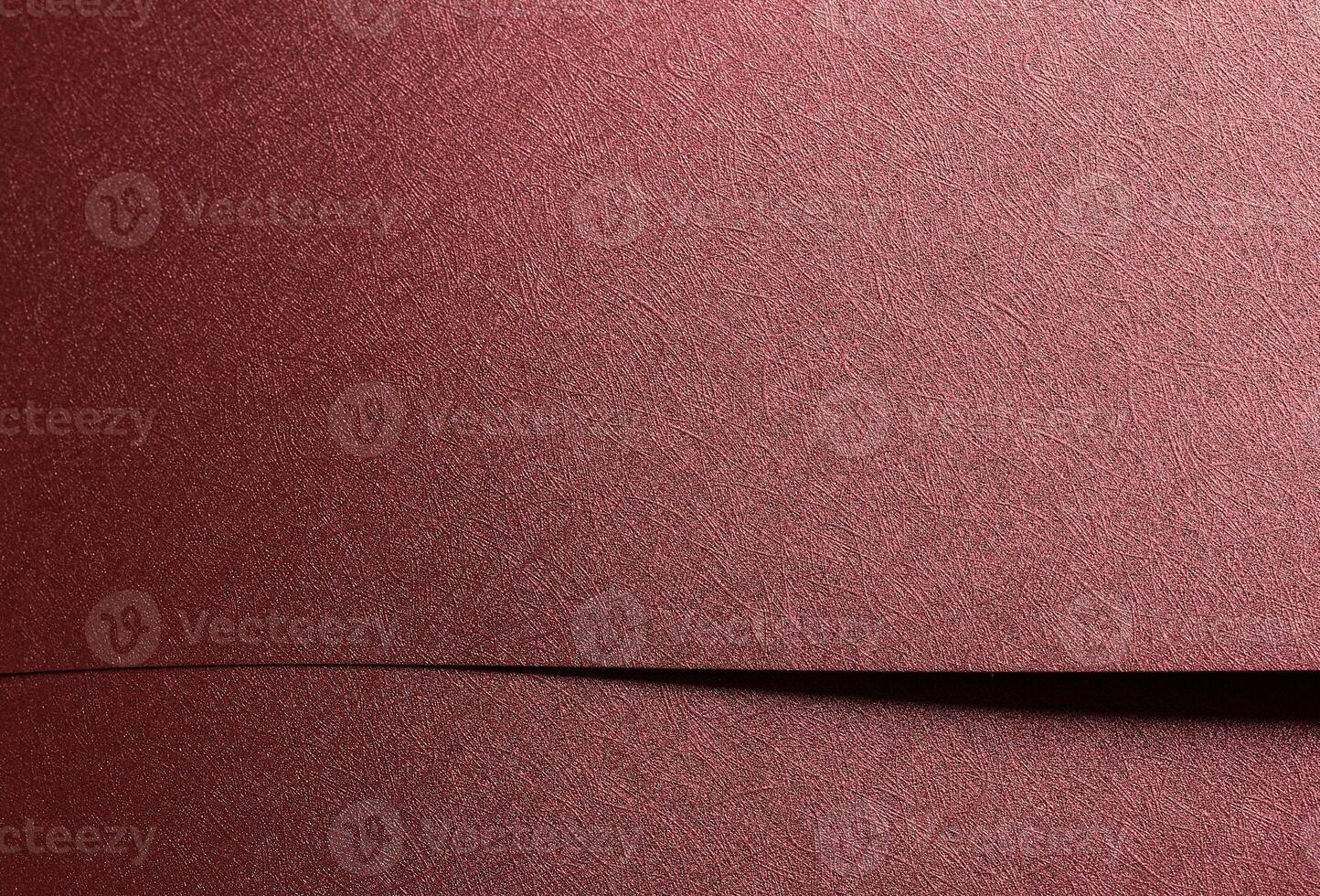 Chic paper closeup. Monochrome red and marsala surface with metallic gloss, geometric overlap, photo