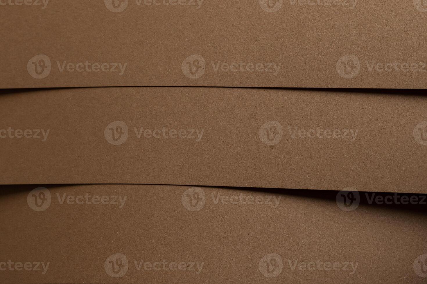 Elegant chocolate brown designer paper sheet with smooth matte texture. Simple, minimalistic photo