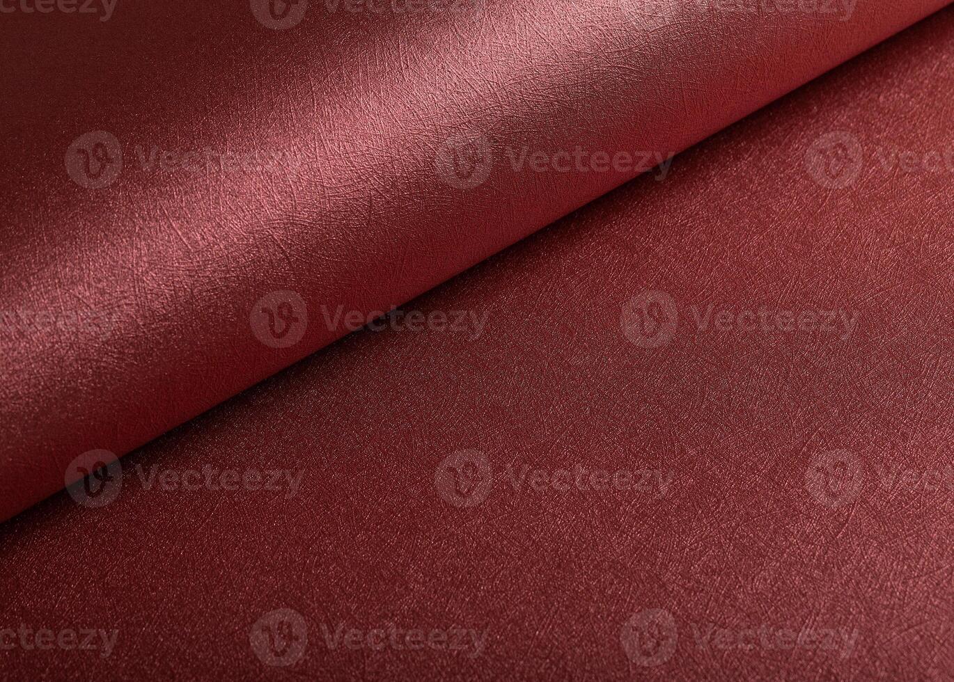 Designer paper closeup. Premium red and marsala surface with metallic gloss, smooth gradient, photo