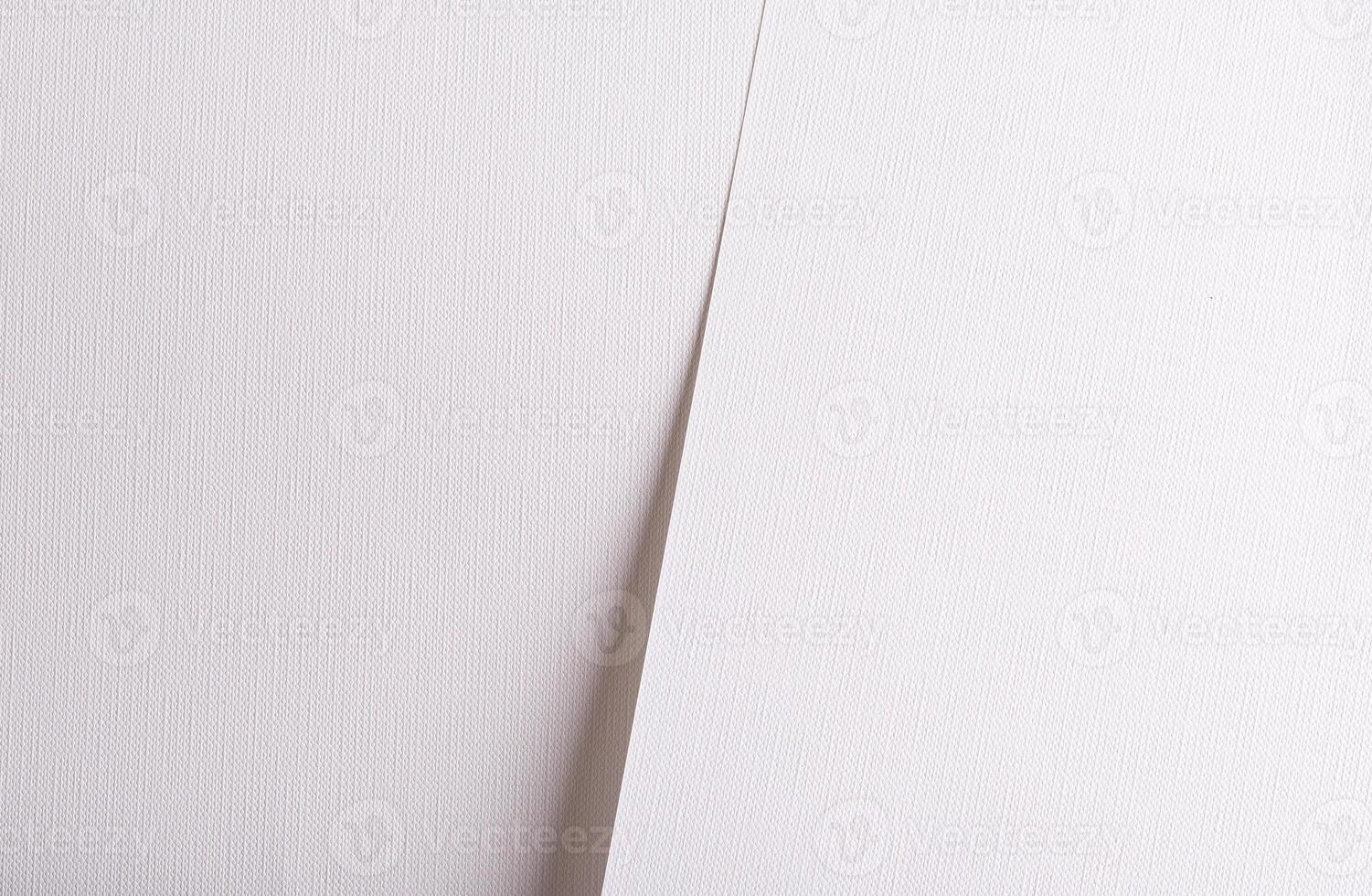 A clean, elegant white paper texture with a subtle woven structure, offering a refined and minimal photo