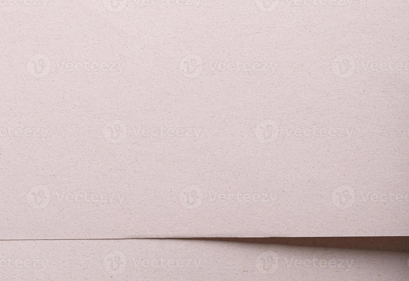 Rustic craft paper with a speckled, mottled texture in earthy brown tones, perfect for eco friendly photo