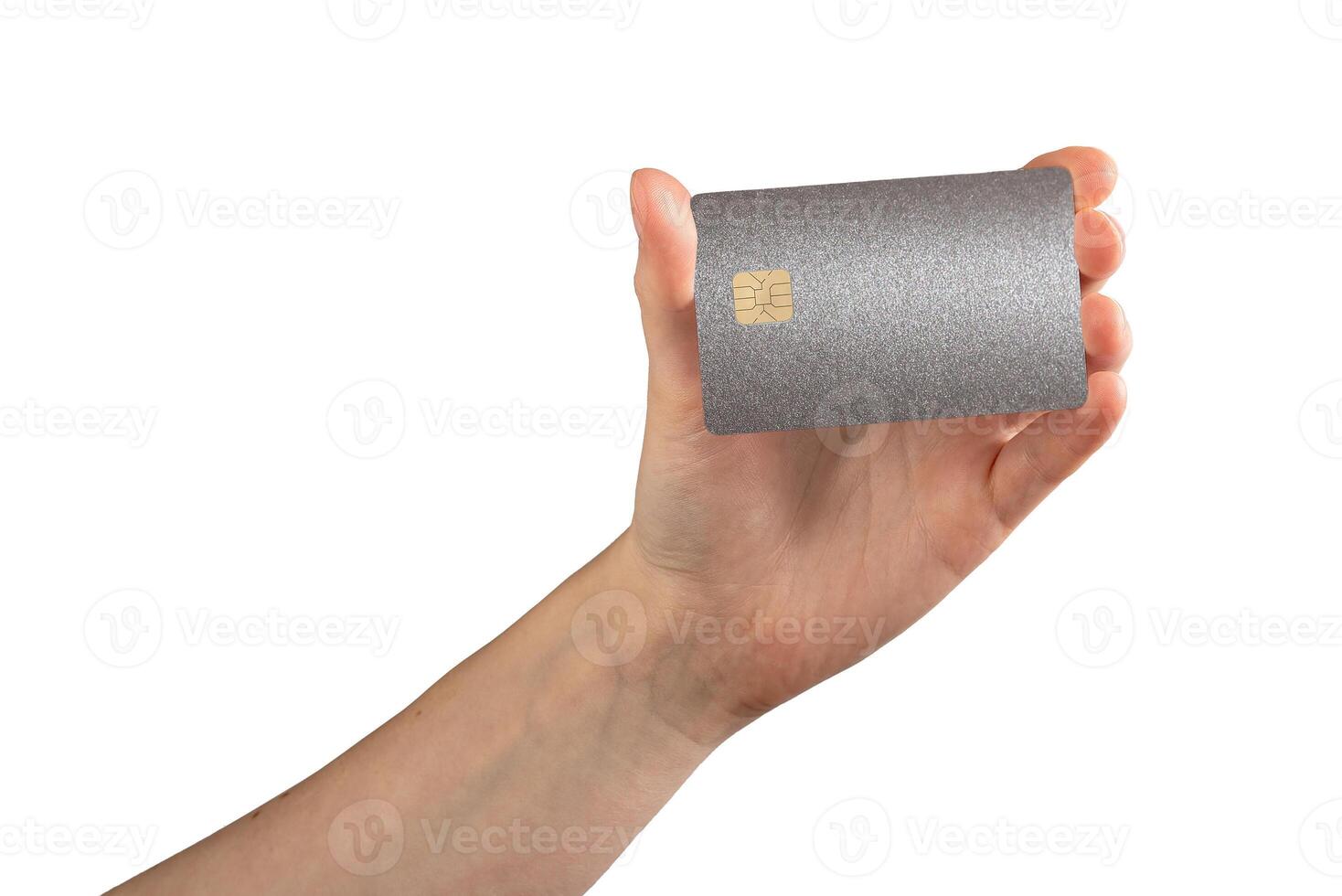 Bank card in hand, with debit or credit card and chip for secure payment. Financial service, online photo