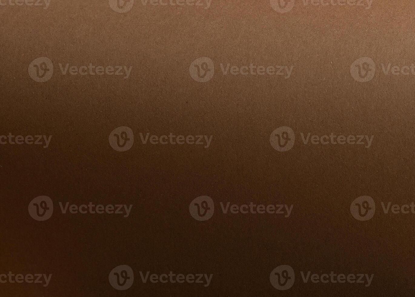 Chocolate brown designer paper sheet with smooth matte texture. Simple, minimalistic background, photo