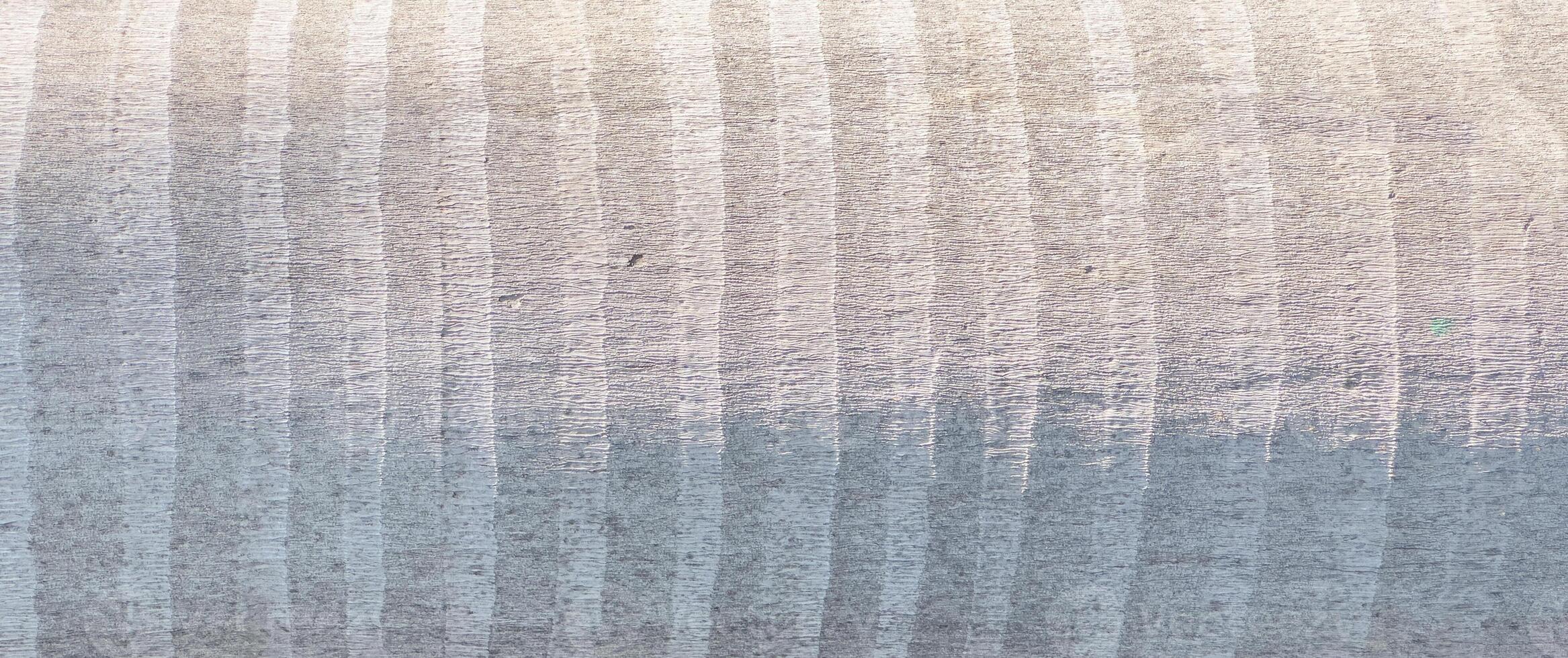 Close up of palm tree trunk with striped, gray bark texture. Organic, rough surface showcasing photo