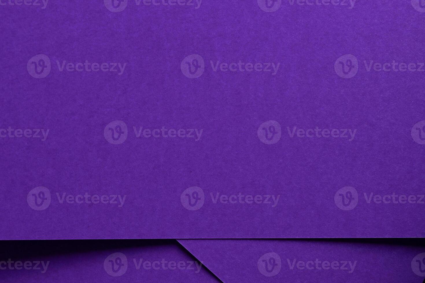 Elegant designer paper in bright and dark violet purple tones with matte texture and monochrome photo