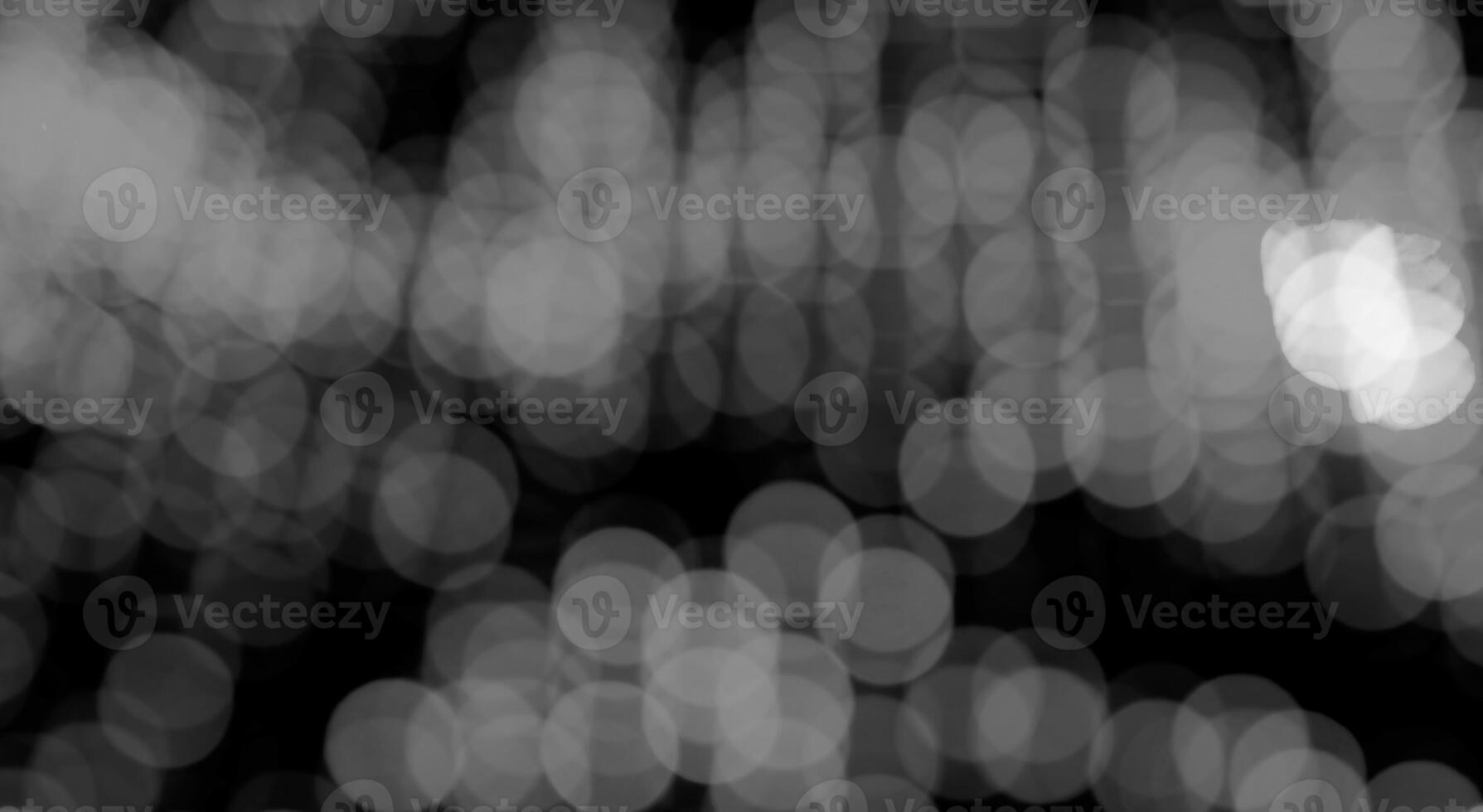 bokeh lights creating a soft, festive glow with a blur of circles and dots. The defocused, twinkling photo