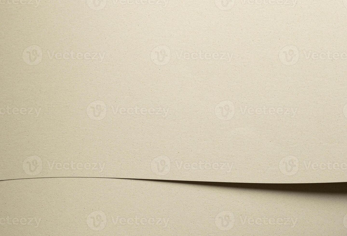 Beige and green recycled designer paper backdrop. Muted, speckled texture with raw, cardboard photo