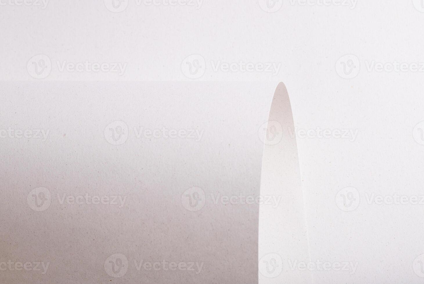 Premium monochrome paper texture with a minimalistic design and elegant folds. The pastel, matte photo