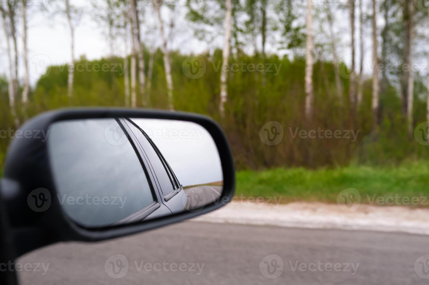 A side view mirror on a car photo