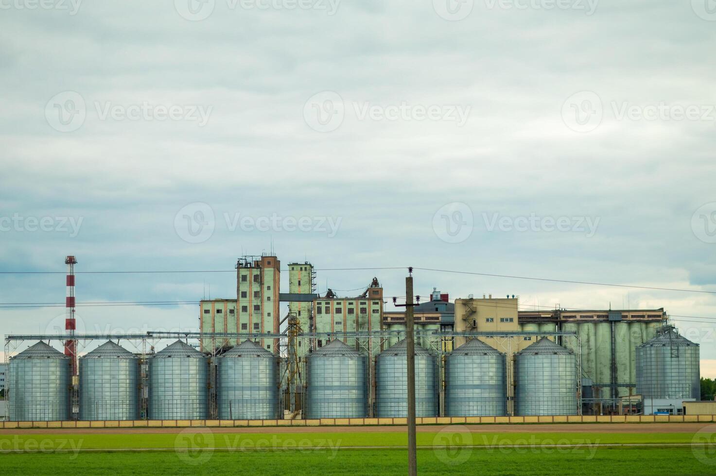 A large building with many silos photo