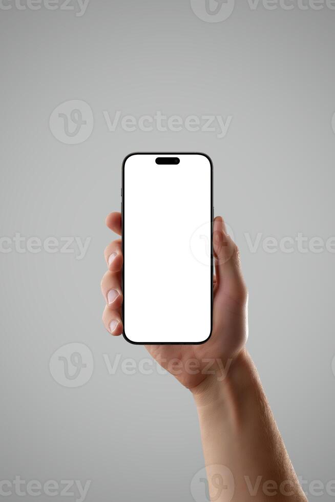Realistic smartphone in male hand on gray background with dramatic lighting, perfect for showcasing premium app UI, tech products, or mobile concepts photo