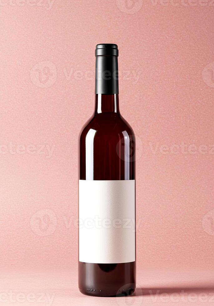 A bottle of wine on a pink background photo