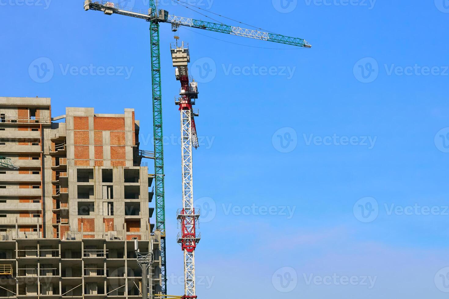 Construction building.New building.Large high rise cranes photo