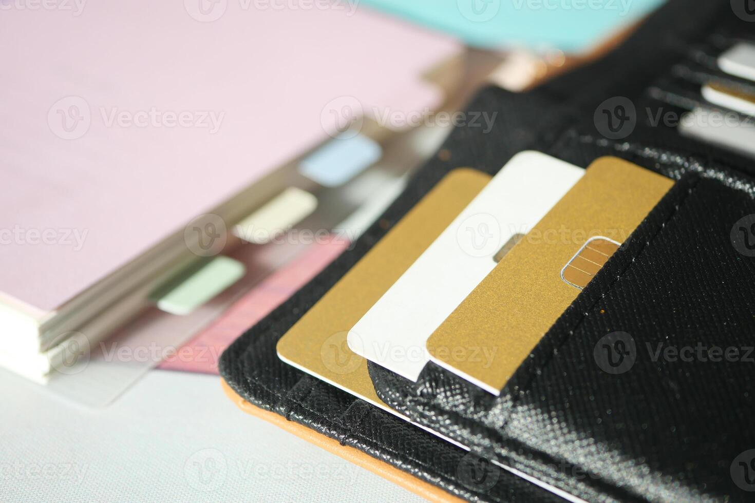 Wallet with cards and documents on a table photo