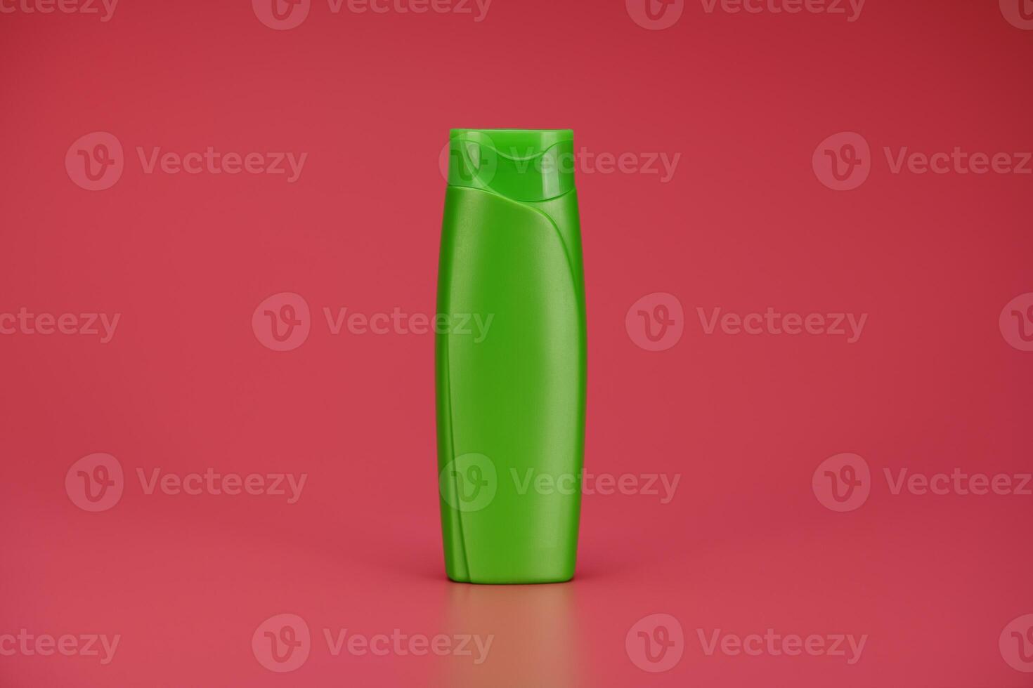 Green Blank Label Shampoo Bottle or Shower Gel on Pink Background photo