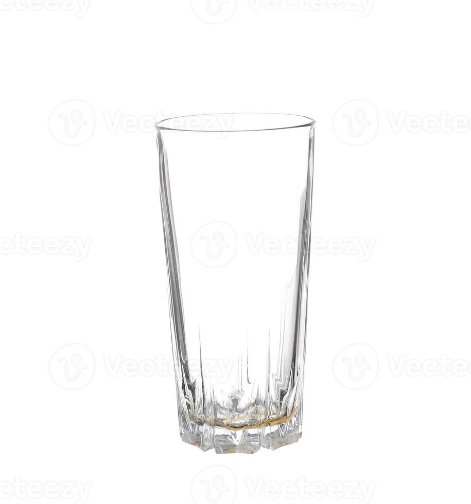 A tall empty glass with a white background photo