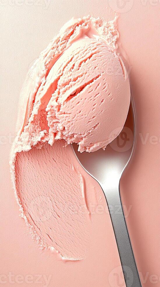 Pink Sweet Dessert Scoop on Spoon. Frozen Gluten free Treat Close Up. Low carb Food Concept. Delicious Sugar free Meal photo