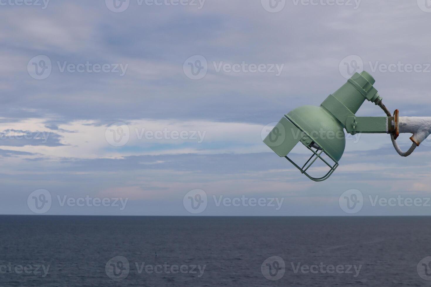 A light pole on the side of a boat photo