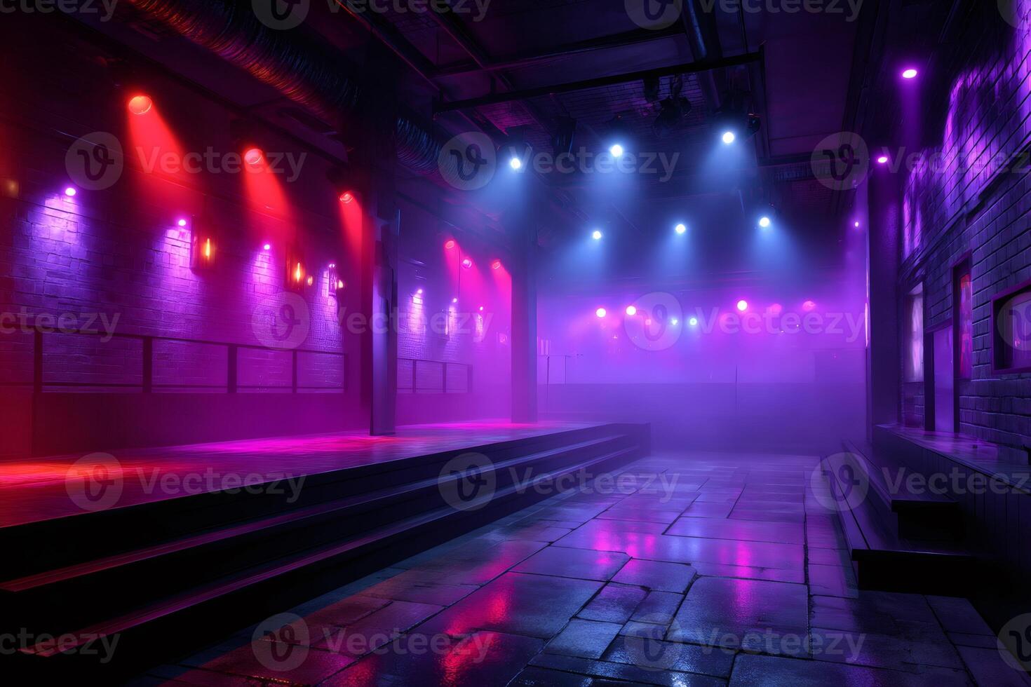 Empty underground nightclub illuminated with pink and blue lights photo
