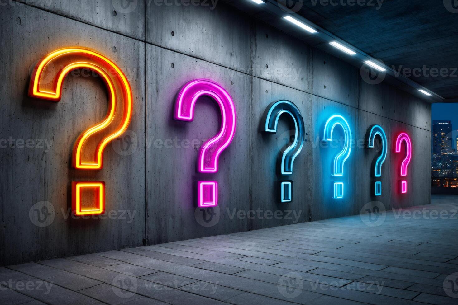 Many neon questions hanging on a concrete wall in empty underground space photo