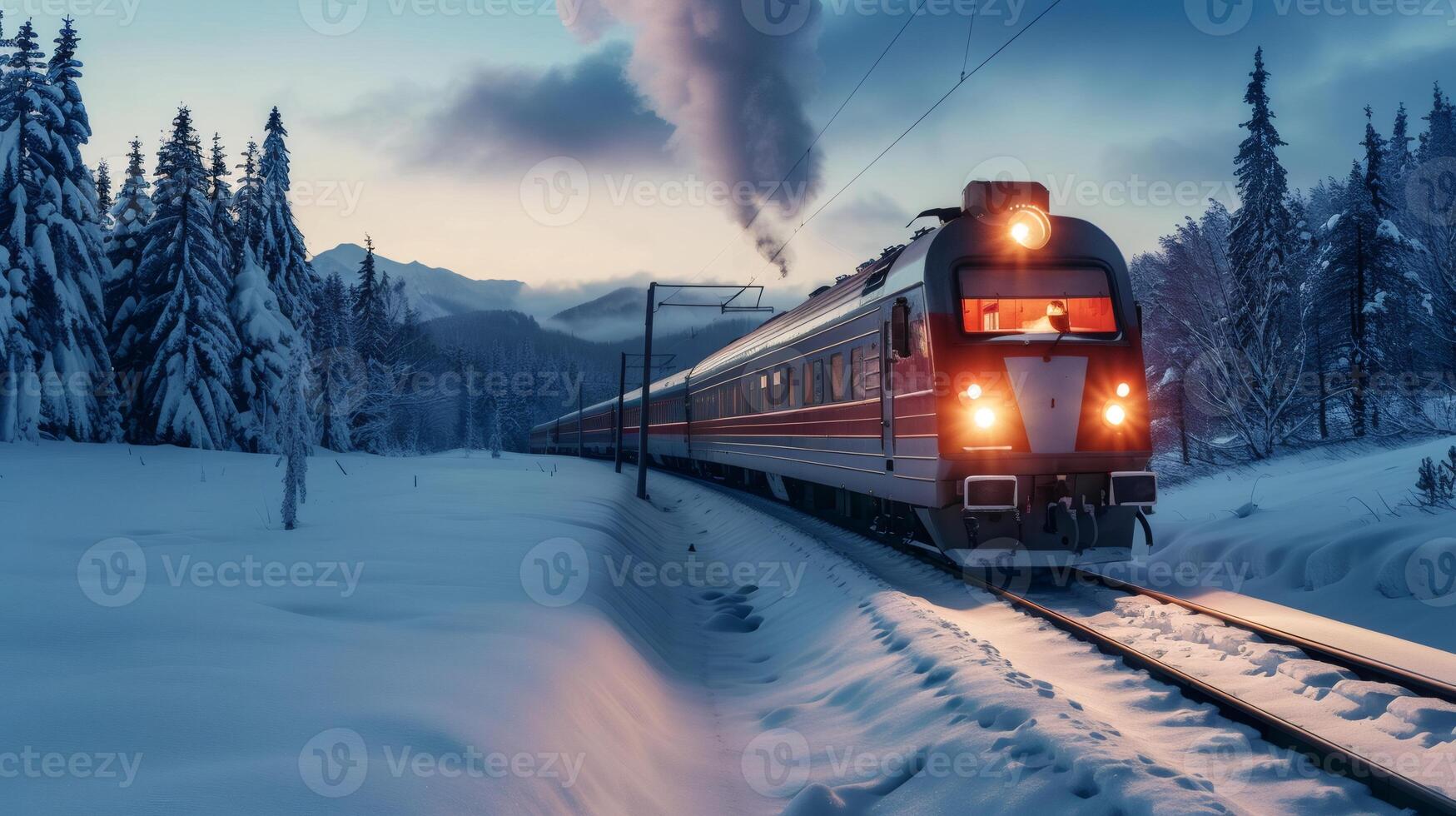 Passenger train traveling through snowy mountains at dusk photo