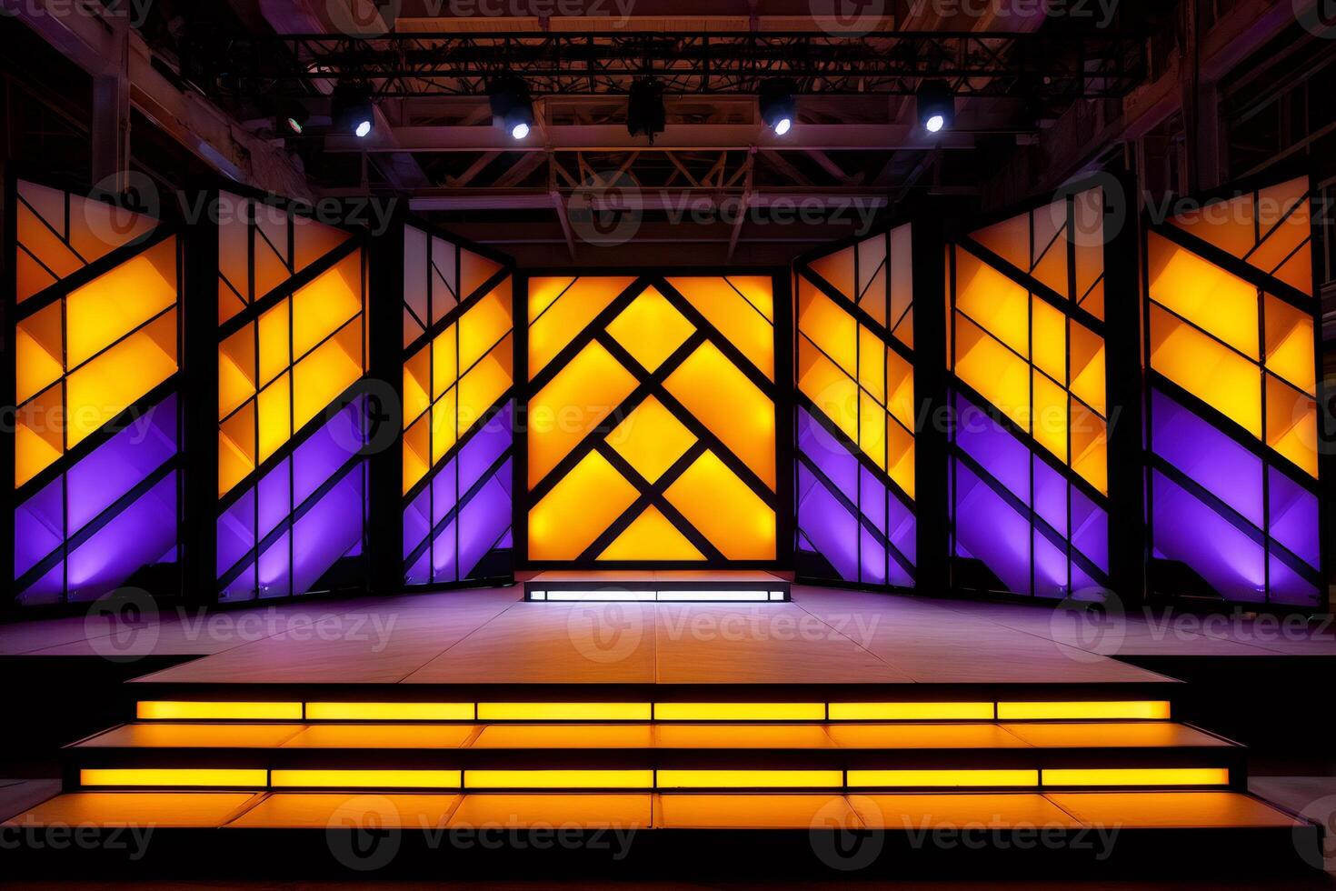 Illuminated stage setting with orange and purple panels photo