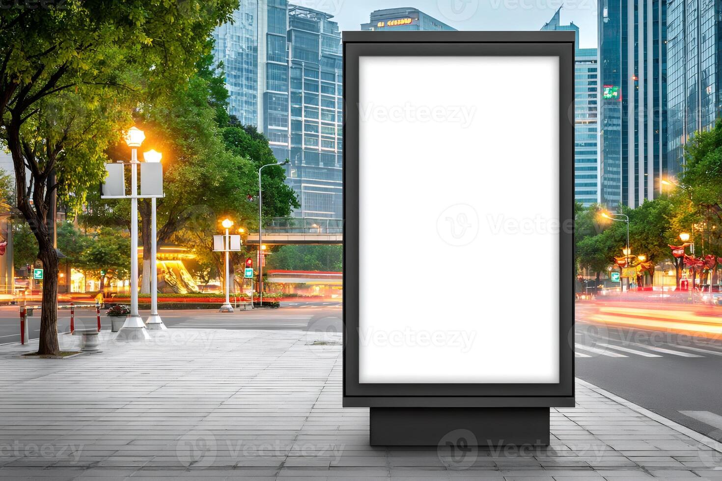 Blank billboard mockup in a modern city at dusk with light trails photo