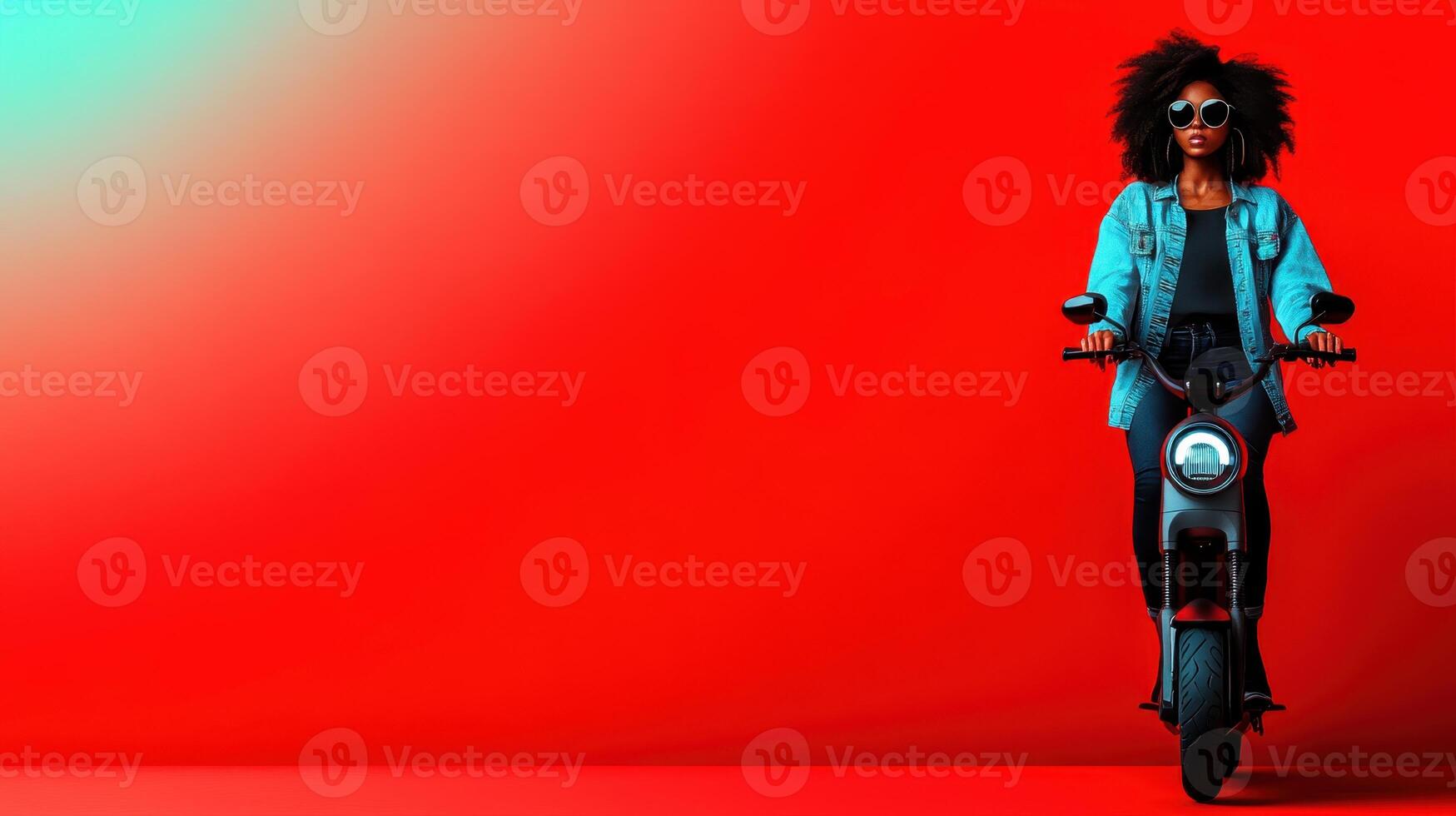 Young woman riding an electric scooter against a vibrant red background in an urban setting during daylight hours photo
