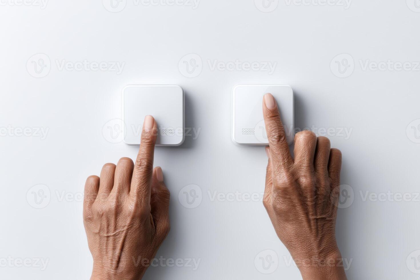 Emergency call alarms for seniors with an older adult activating a device on a white background photo