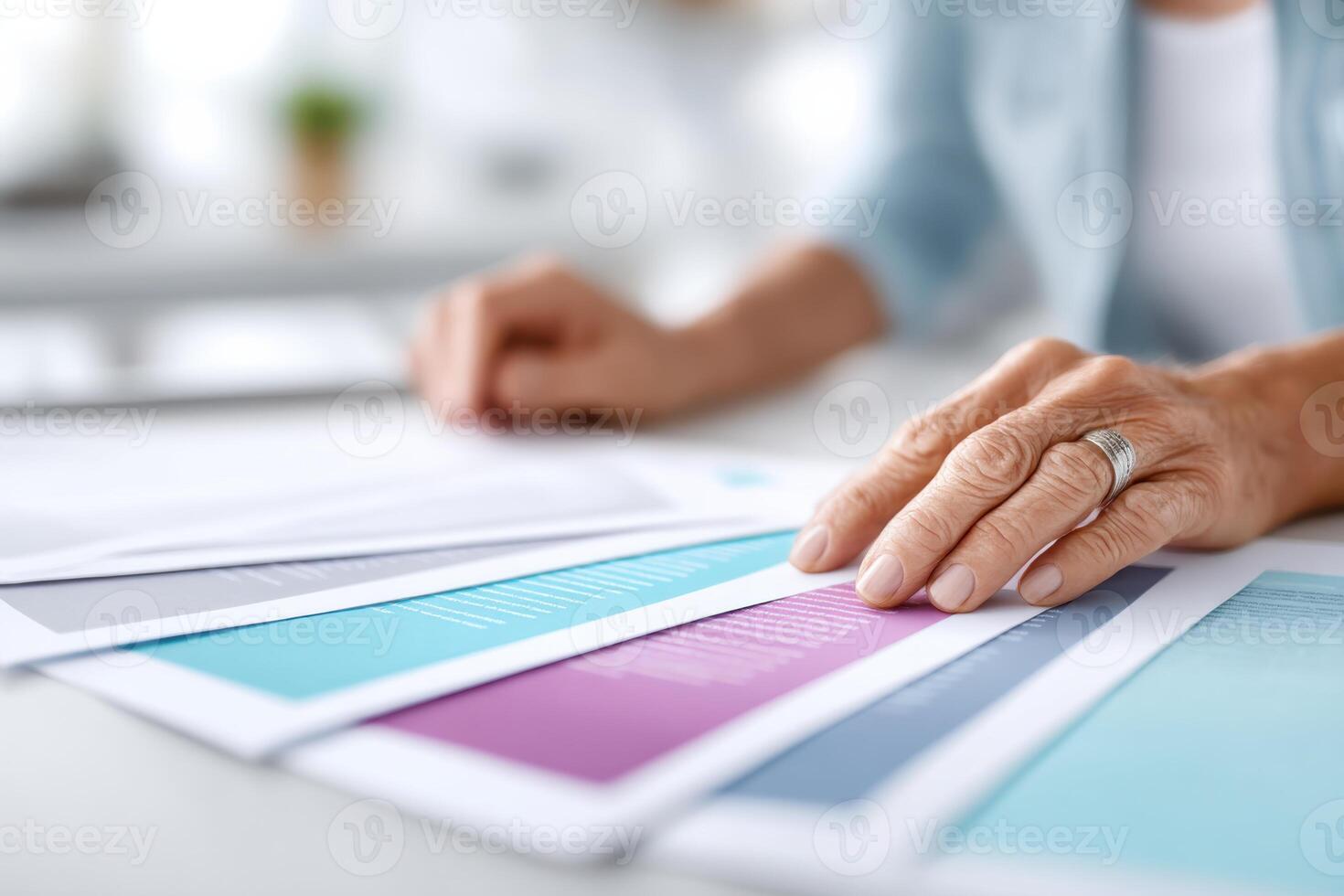 Handling official documents with precision in a vibrant workspace environment photo