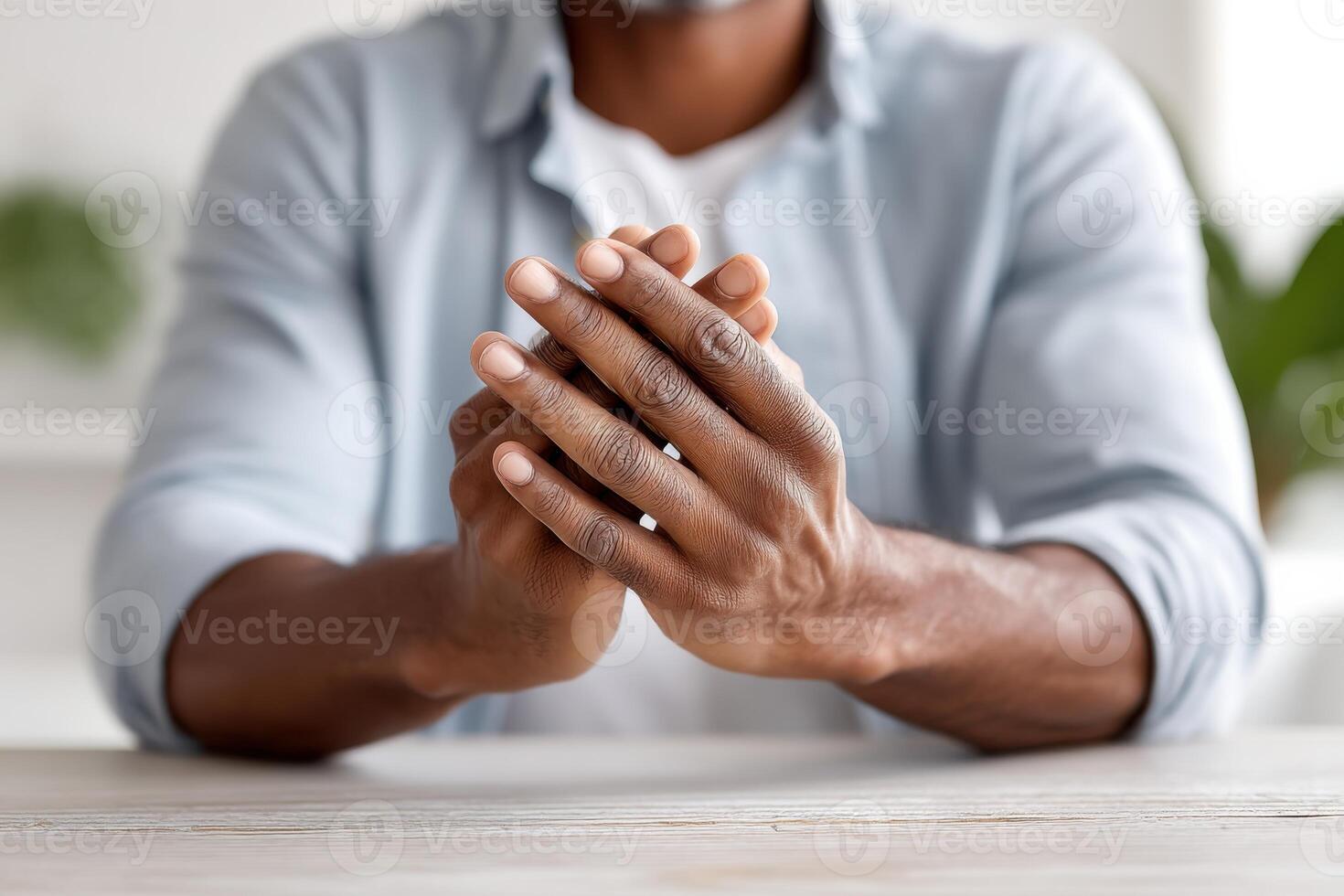 Close-up of hands in a respectful gesture in a calm and peaceful setting photo