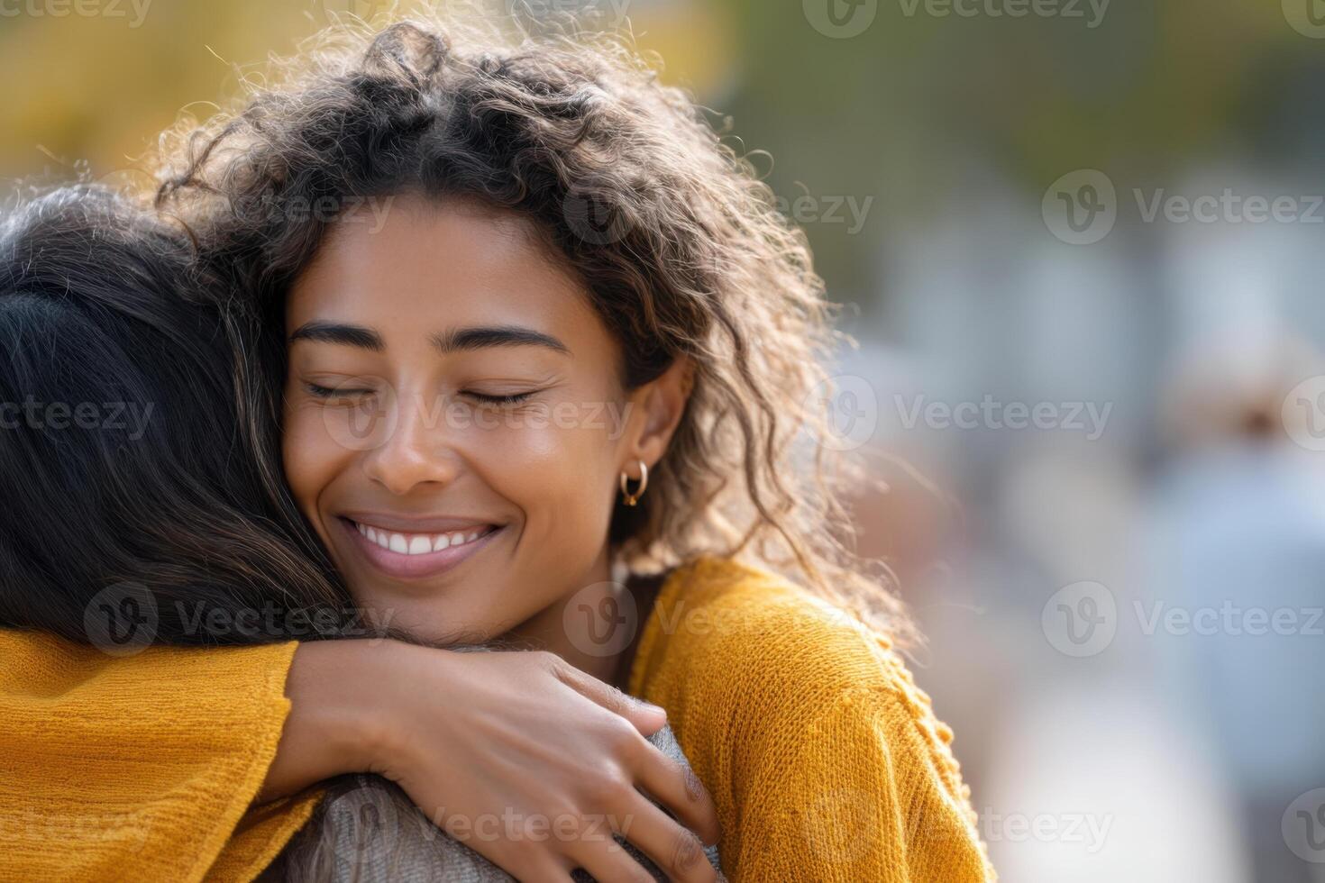 Supportive friendship between Latino teens in a warm outdoor setting fosters trust and connection photo