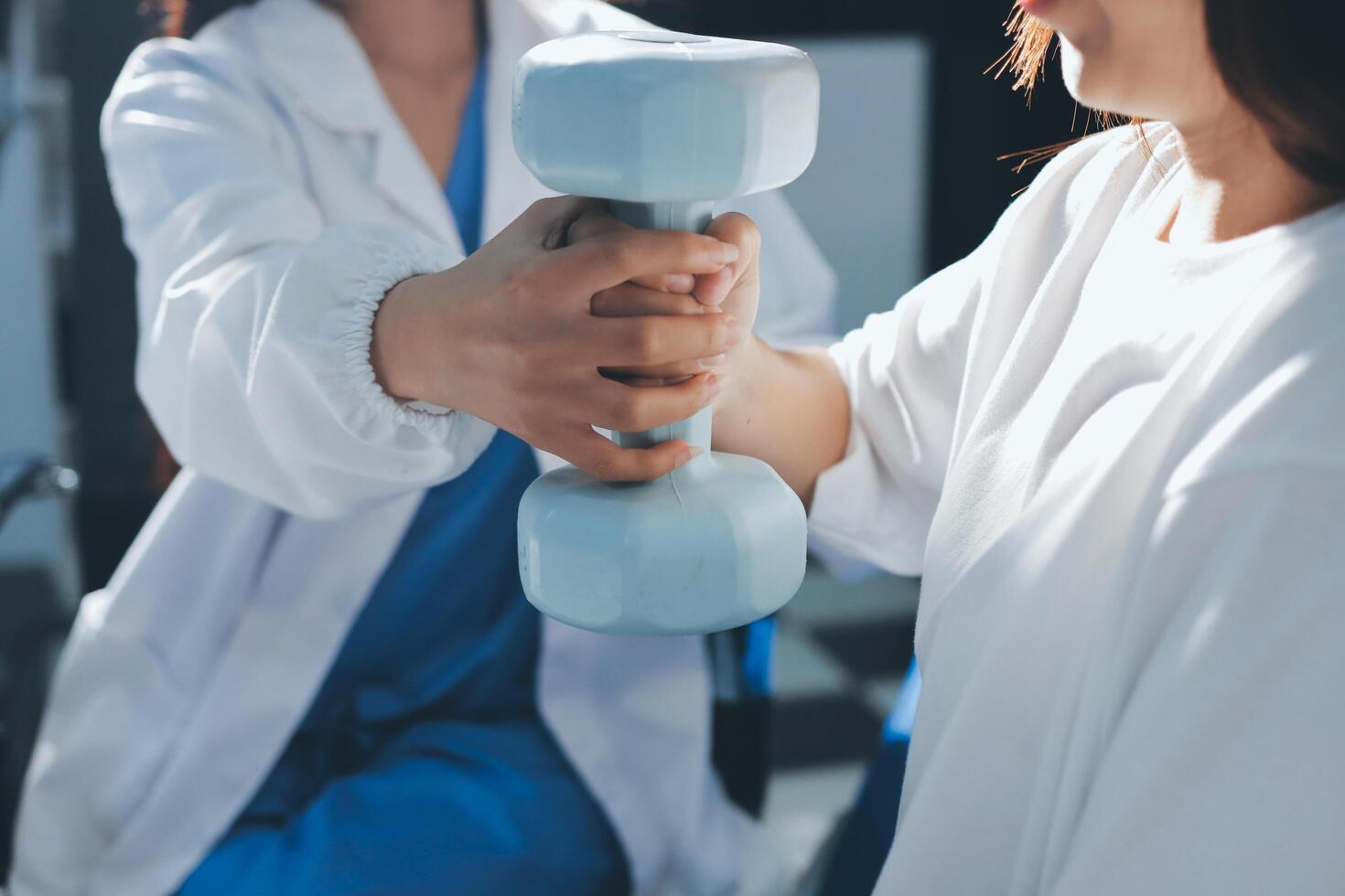 A woman is holding a dumbbell while another woman is doing the same photo
