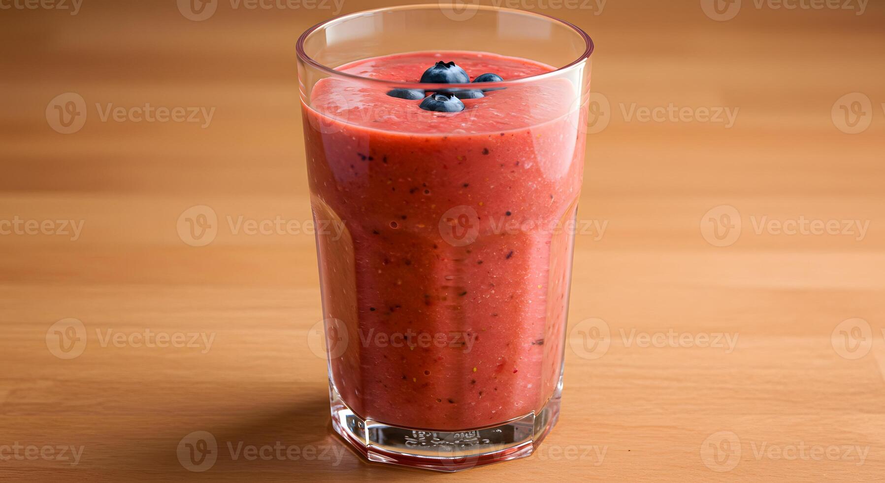 Vibrant Strawberry Blueberry Smoothie in Glass on Wooden Table, Healthy Drink photo