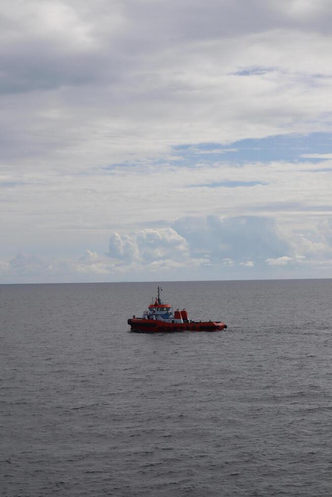 A boat in the ocean photo