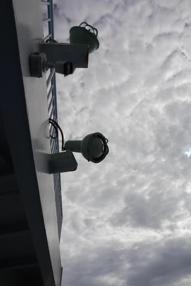 A view of a sky with clouds and a sun photo
