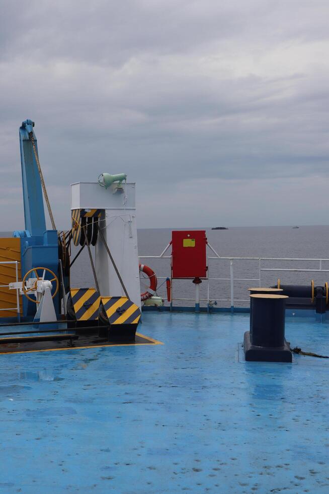 A boat with a crane on it photo