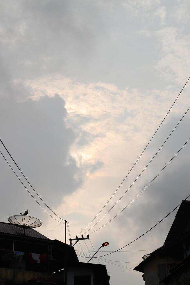 A cloudy sky with a few clouds photo