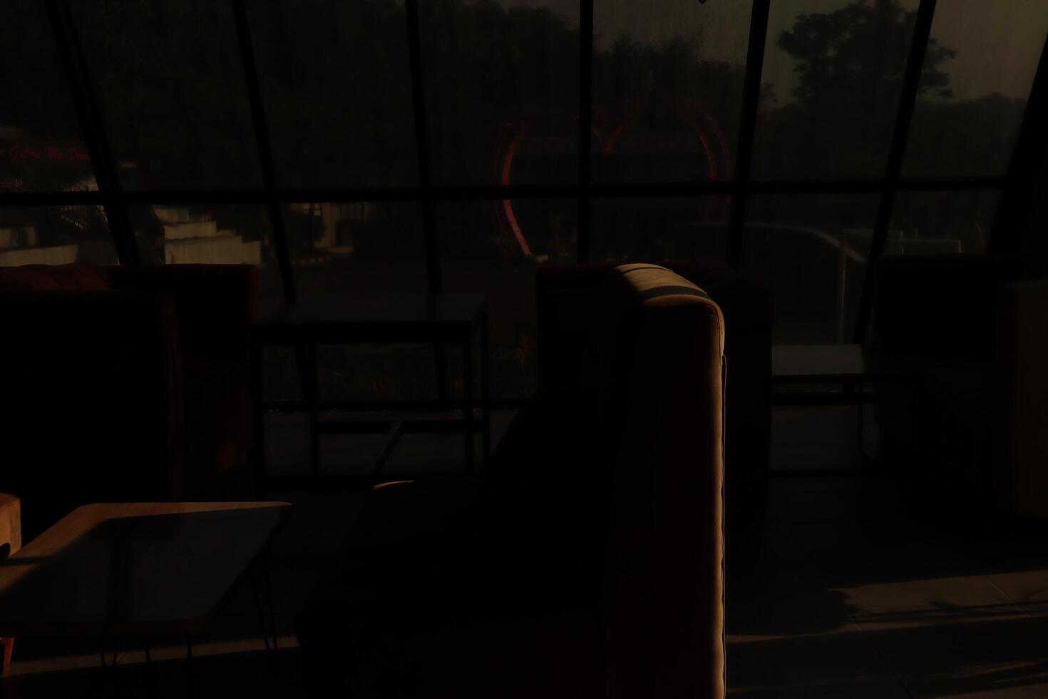 A room with a couch and a table photo