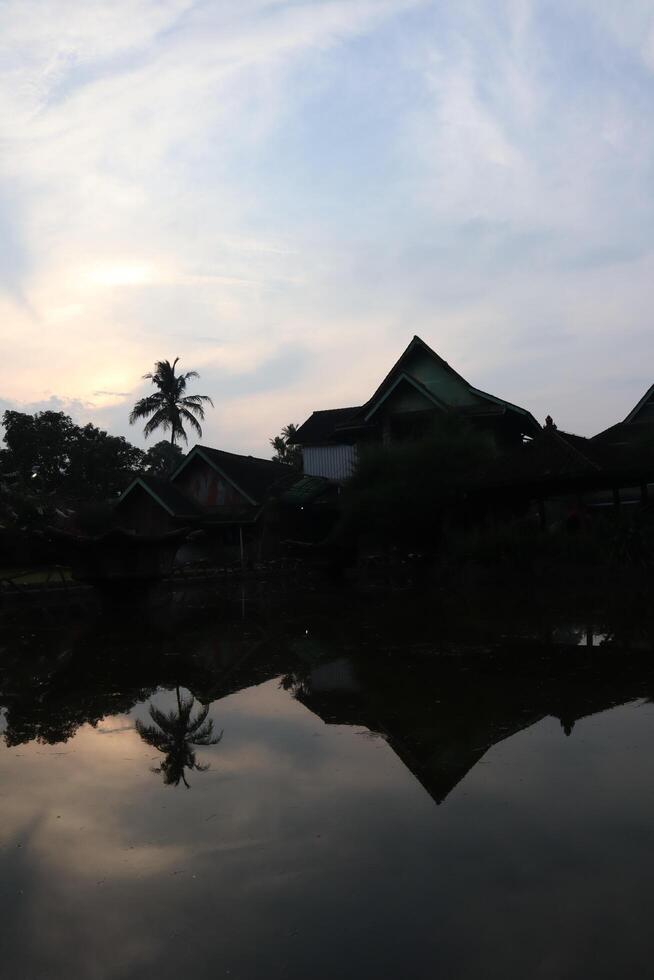 A reflection of a building in the water photo